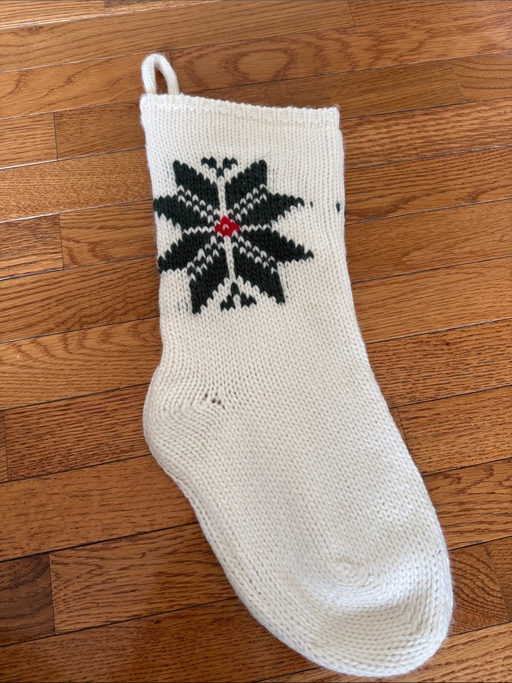 Cream Knit Holiday Stocking with Black Snowflake and Red Accent